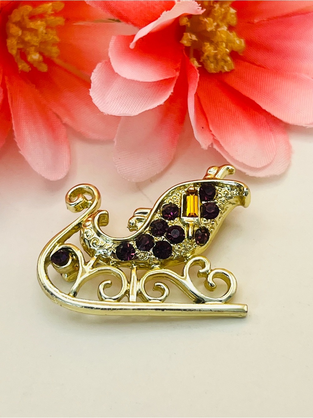 Gold-Tone Sleigh Brooch with Purple and Amber Crystals